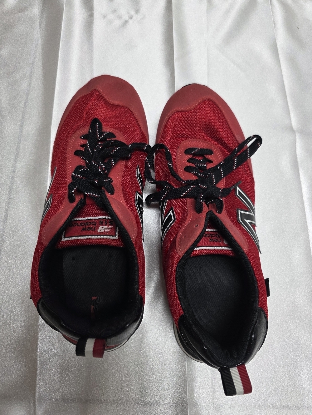 New Balance Red and Black Low-Top Sneakers